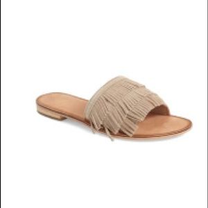 Gently used Seychelles flat fringe slides